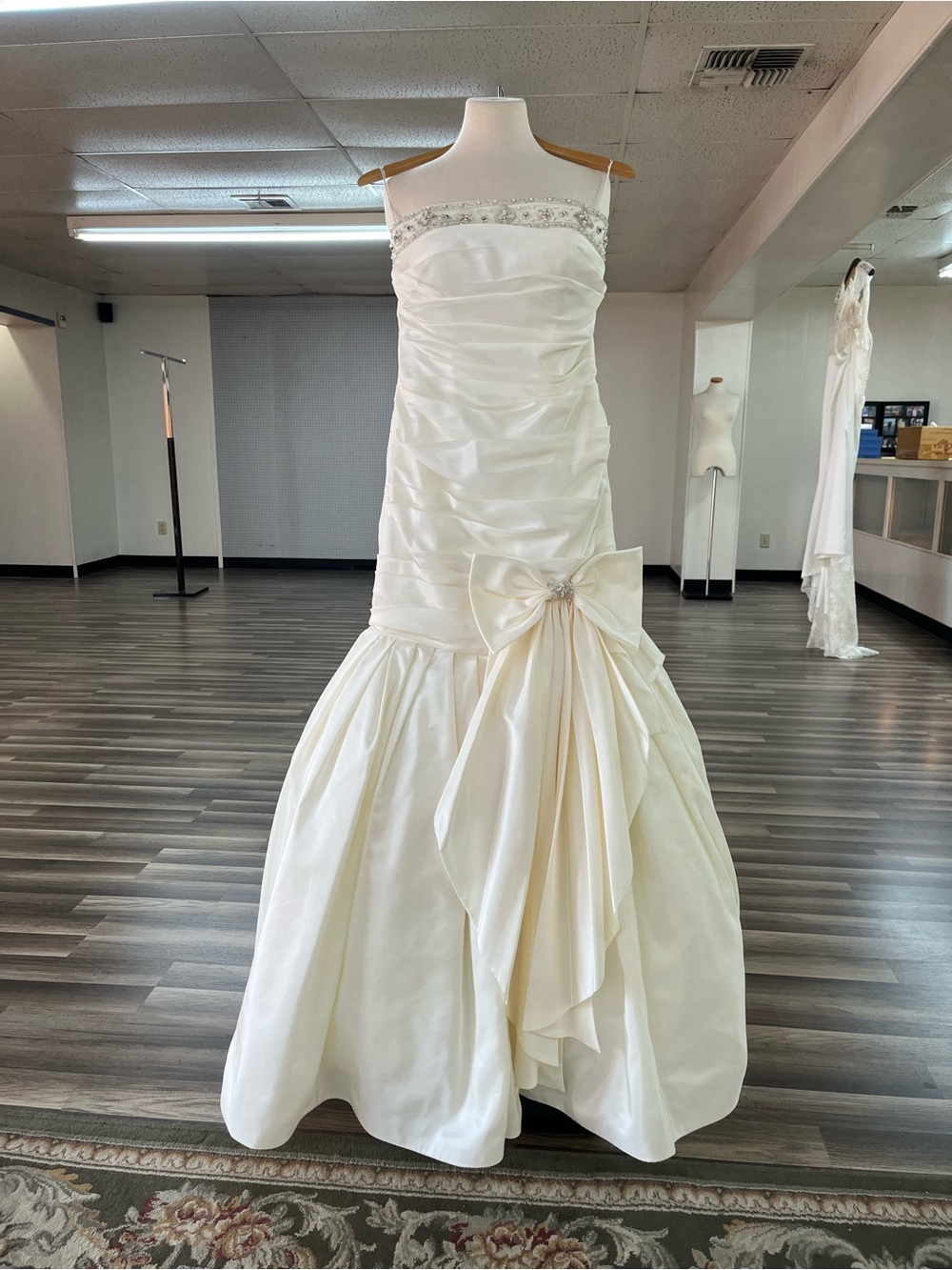 Ivory Strapless Taffeta Bridal Ball Gown with Bow Accent